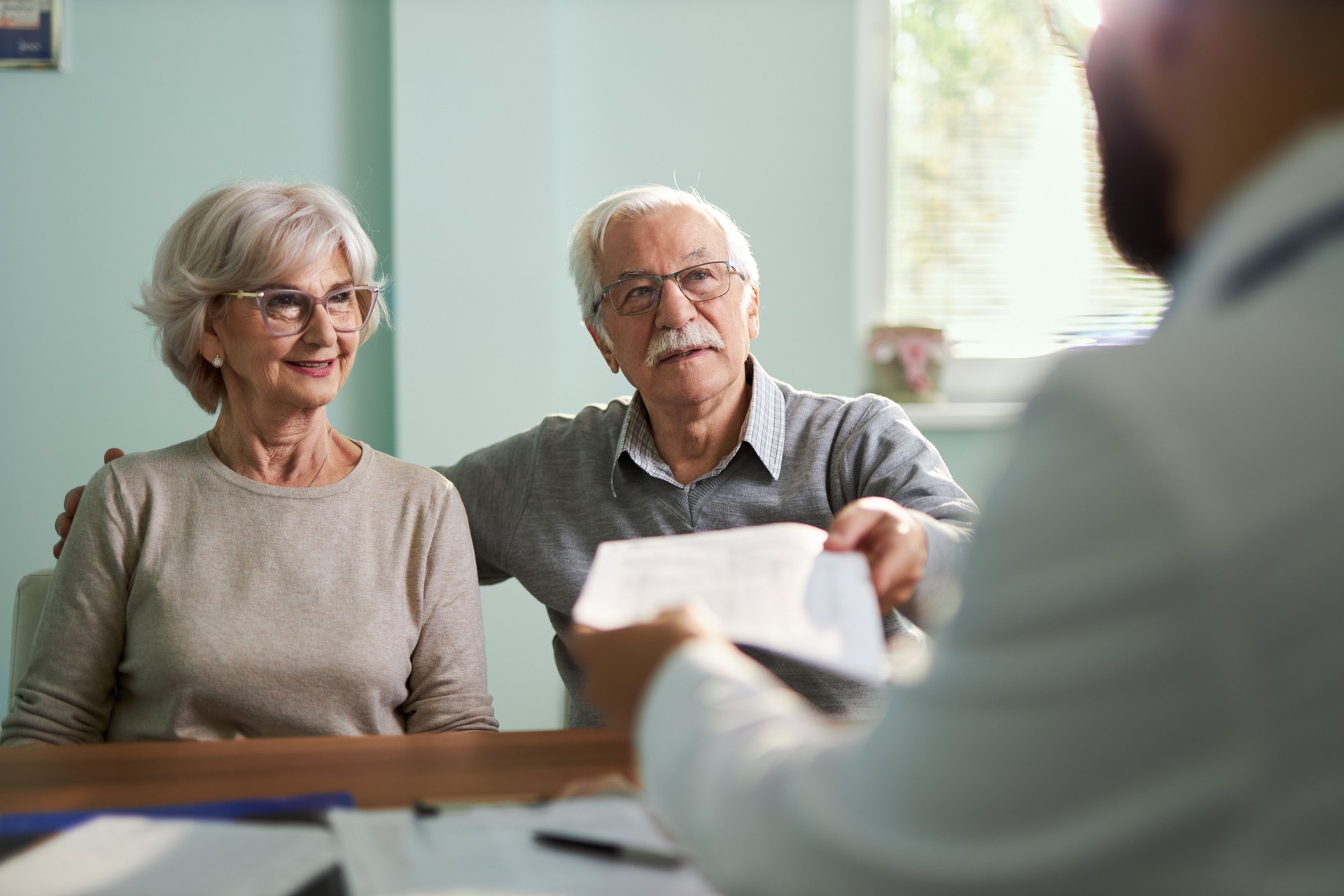 Senior couple visit doctor
